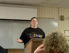 Person speaking at a podium